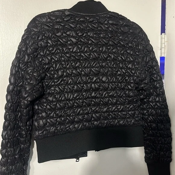 NWOT. Woman’s DKNY Jeans black cropped puffer jacket. Size S. - Picture 6 of 6